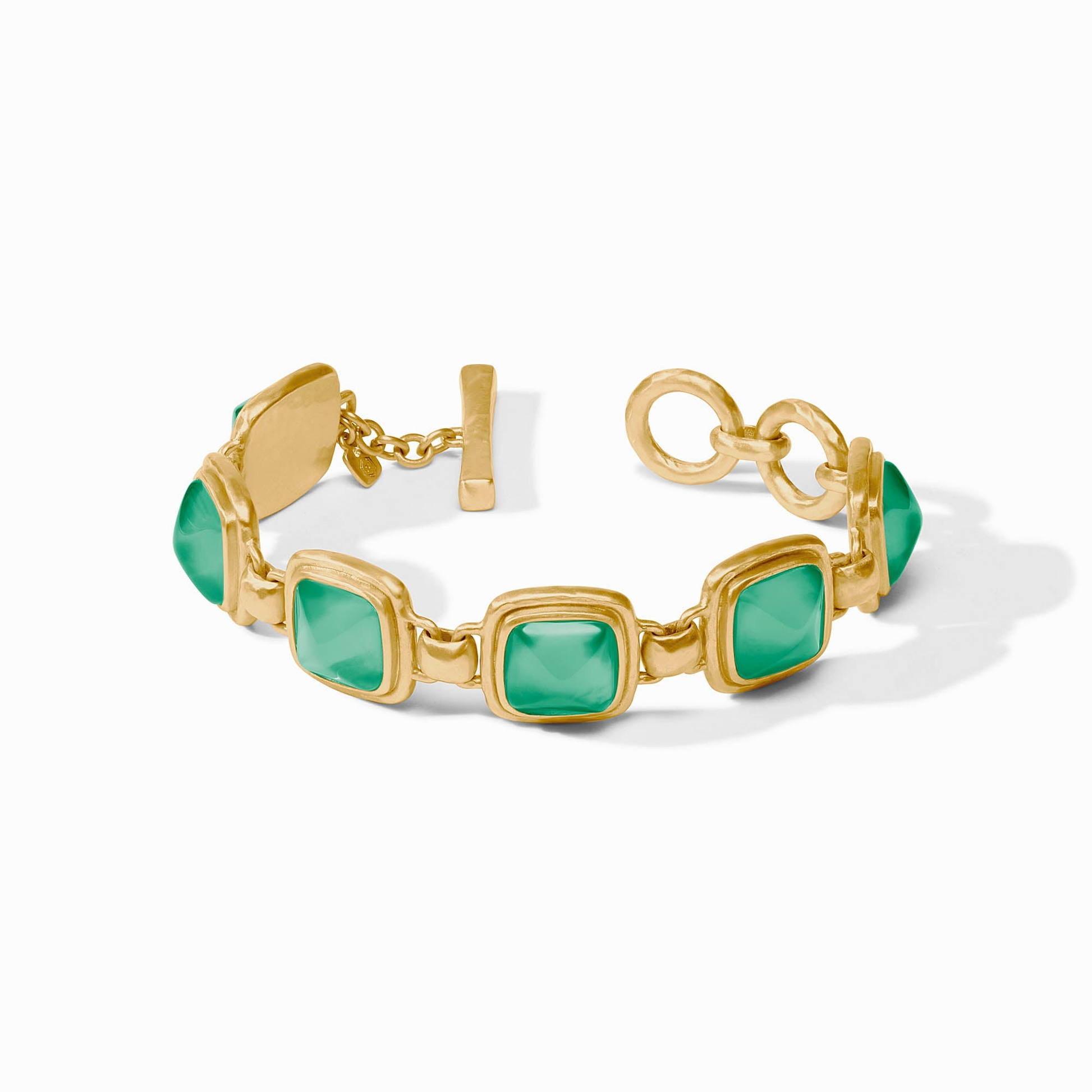 Sahara Stone Bracelet in 24K gold plate with square green glass stones and a toggle closure.