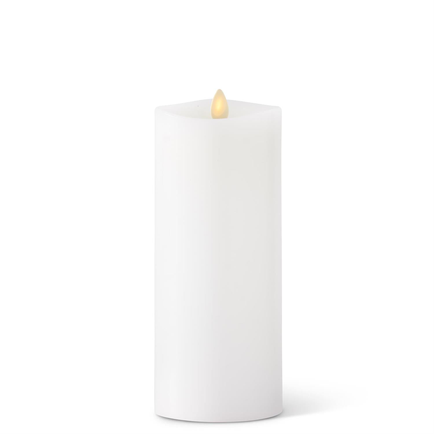 White wax Luminara indoor pillar candle with a realistic flickering LED flame.