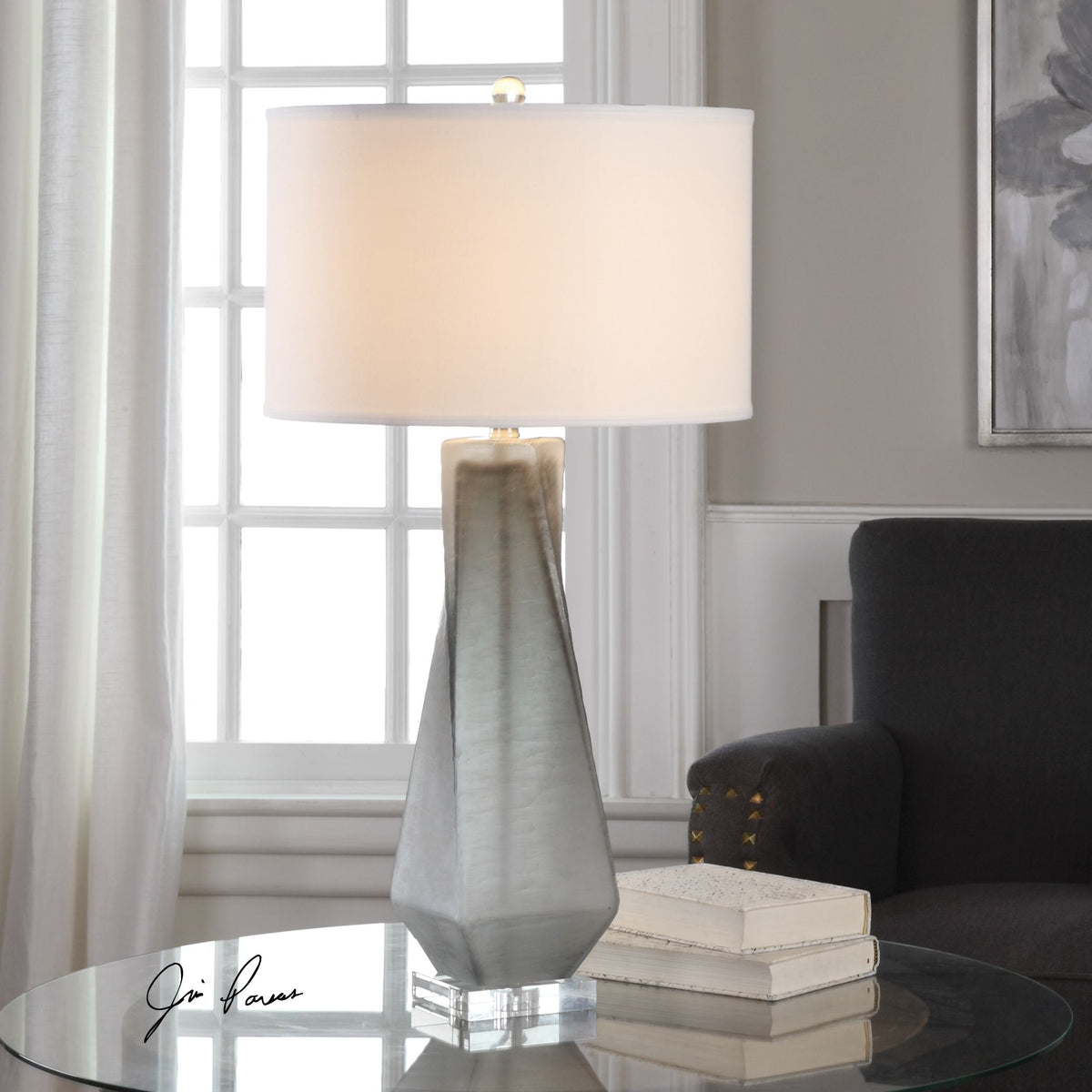 Anatoli charcoal gray table lamp with a cylindrical shade and tapered base.