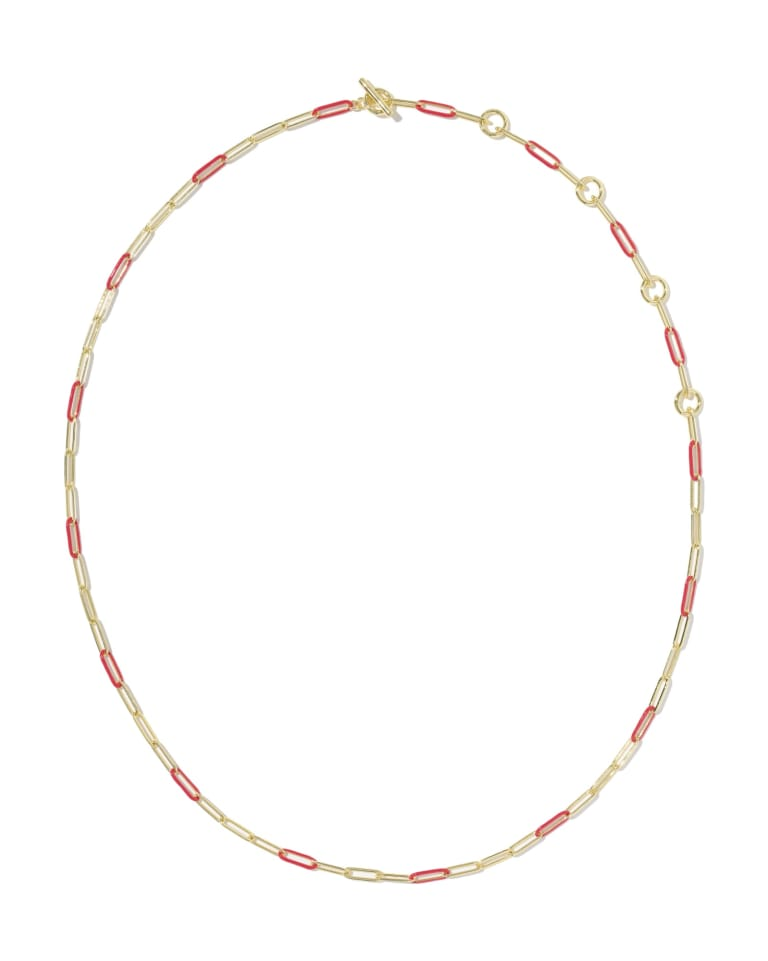 Courtney gold chain necklace with alternating red enamel links and a toggle closure.