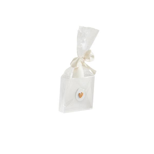 Mini acrylic plaque with a hand-painted heart intaglio icon on its surface.