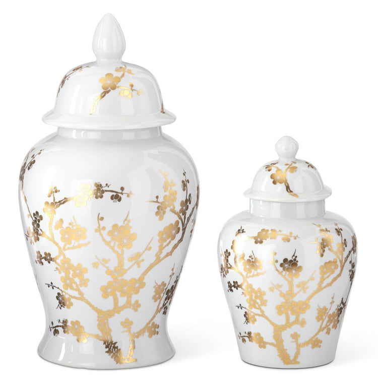 Two white ceramic ginger jars with gold chinoiserie floral patterns and matching lids.