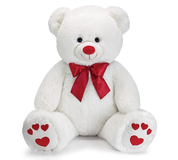 Large white Valentine plush bear standing with a heart-shaped nose.