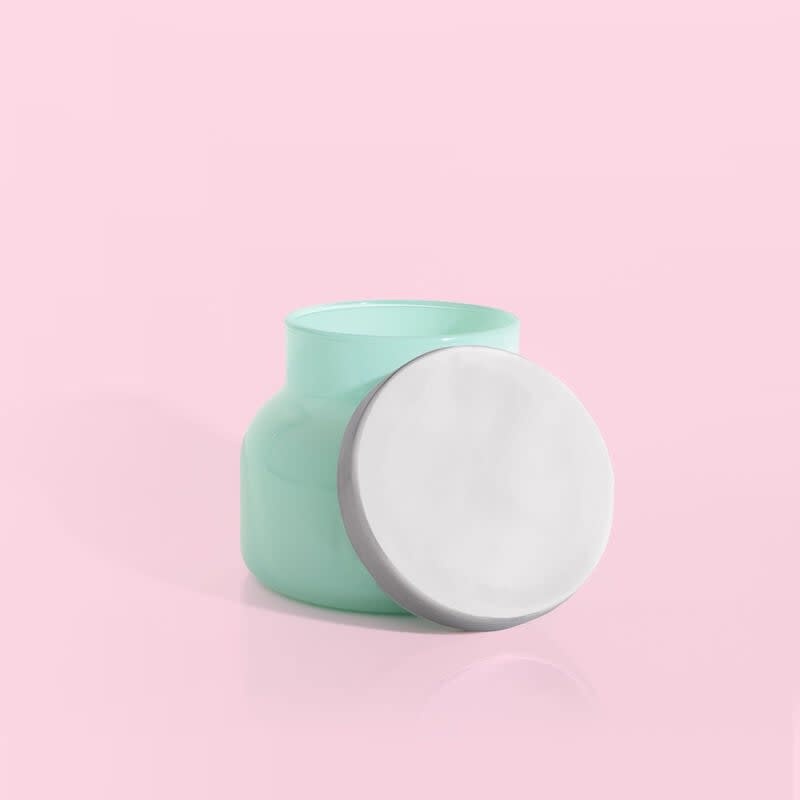 Volcano Aqua Petite signature jar candle in sugared citrus tropical fruit scent with a matte aqua finish.