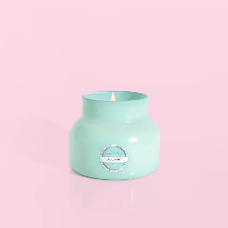 Volcano Aqua Petite signature jar candle in sugared citrus scent with a glossy aqua glass vessel.
