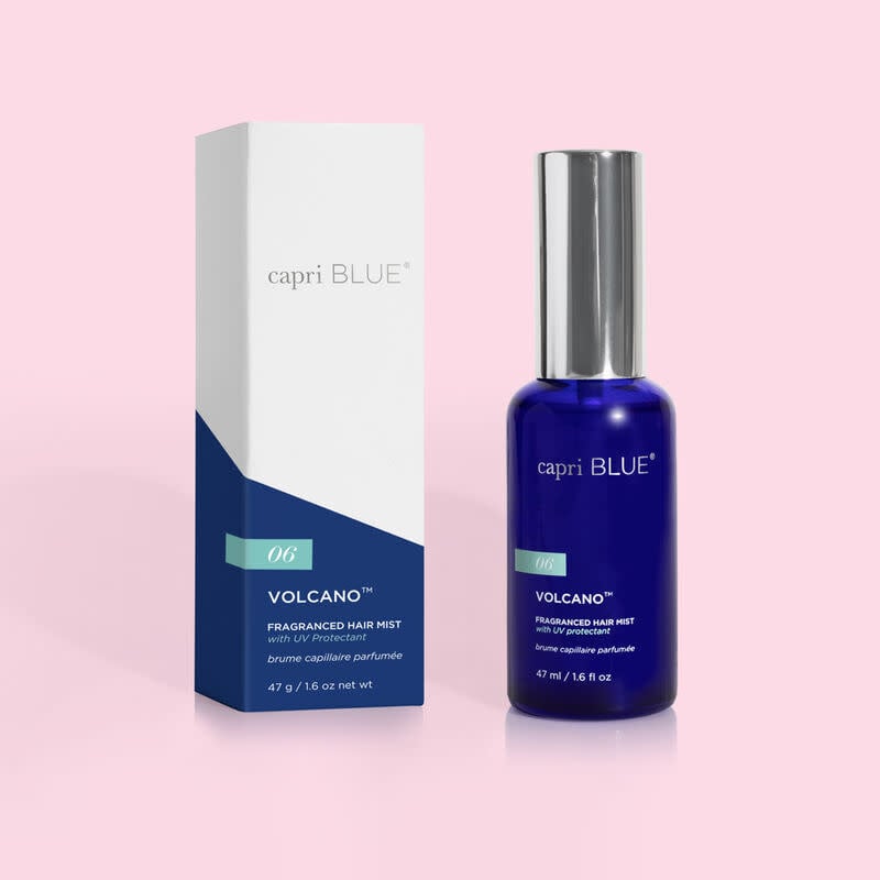 Bottle of Volcano Hair Mist in clear glass with a white pump dispenser.
