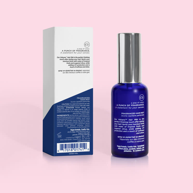Volcano Hair Mist bottle with tropical fruit notes in a clear glass container