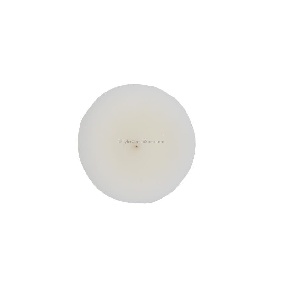 A round, white 2oz votive candle viewed from directly above.