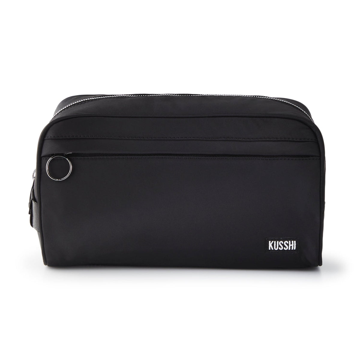 Black nylon Dopp Kit with a silver ring zipper pull and a white KUSSHI logo on the bottom right.