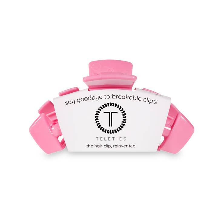 Medium hair clip with bendable teeth in a neutral tone designed for thick to medium-thickness hair.