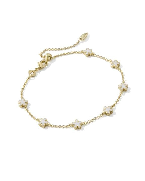 Jane Gold Delicate Chain Bracelet with white enamel flowers and an adjustable lobster clasp.