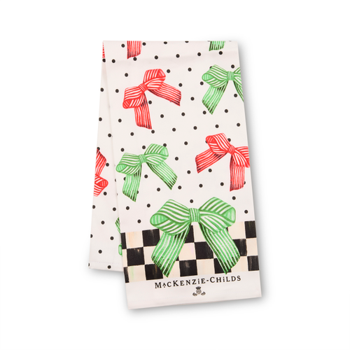 Cotton dish towel with red and green striped bows, black polka dots, and a checkered border.