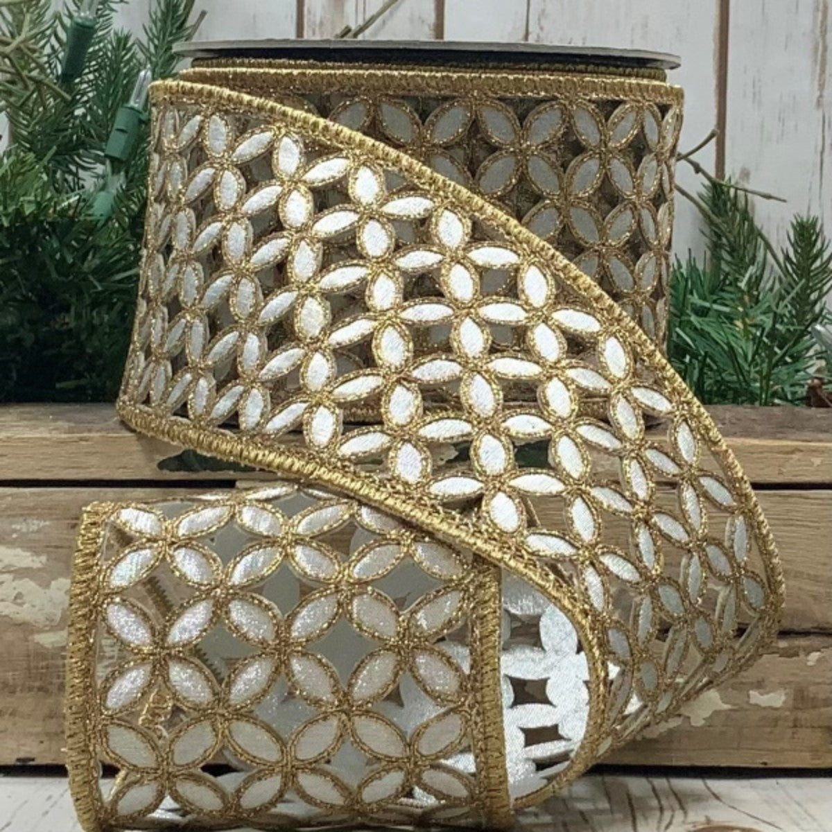Four-inch wide metallic floral garland ribbon with a ten-yard length.