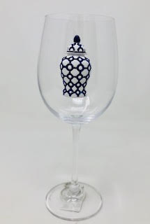 Ginger Jar Jeweled Stemmed vase in amber glass with a jeweled stem and fluted silhouette.
