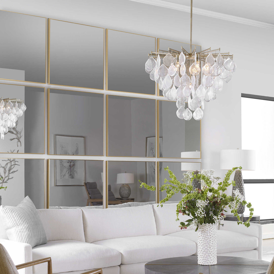 Alexo Gold Square Mirror with a gold metallic frame.