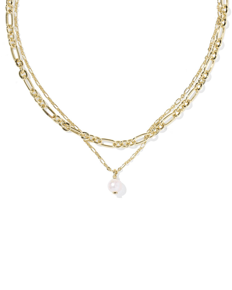 Ashton Multi Strand Necklace featuring two gold Figaro chains and a freshwater cultured pearl.
