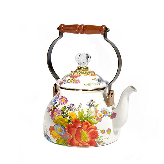 White Flower Market tea kettle with hand-applied floral decals, wood handle, glass lid finial, and bronzed stainless steel rim.