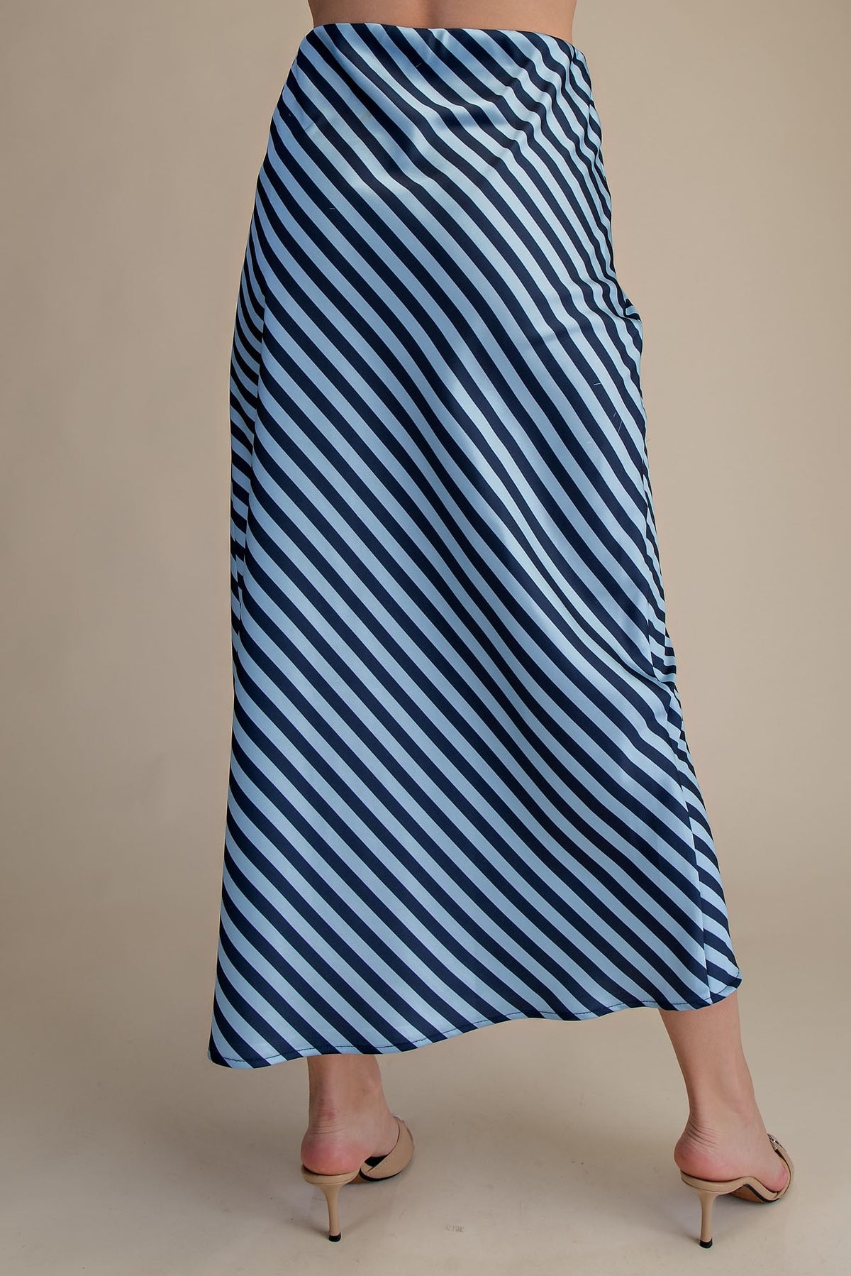 Ella waist elastic band midi skirt in solid black polyester with a straight silhouette.