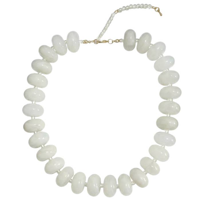 Bailey Chunky Beaded Necklace featuring large, glossy white marbled beads on a gold-tone chain.