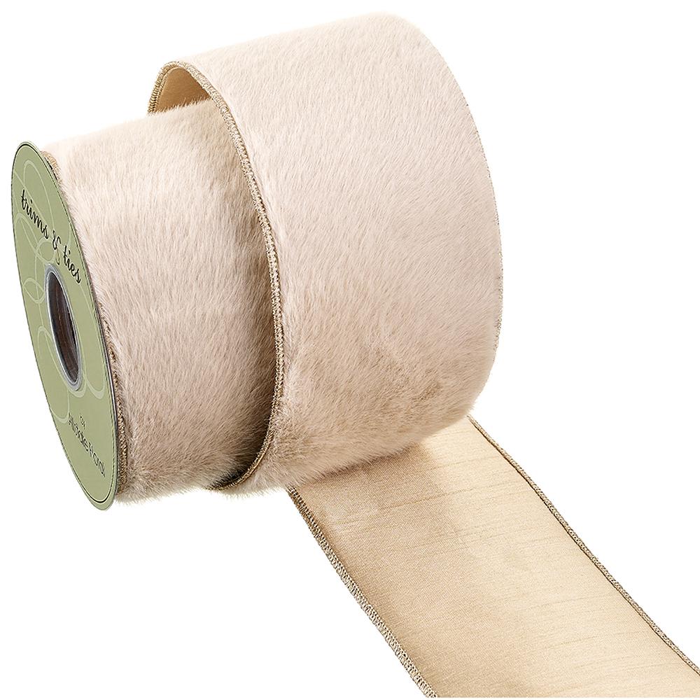 4-inch wide cream faux fur ribbon with gold metallic edges on a spool.