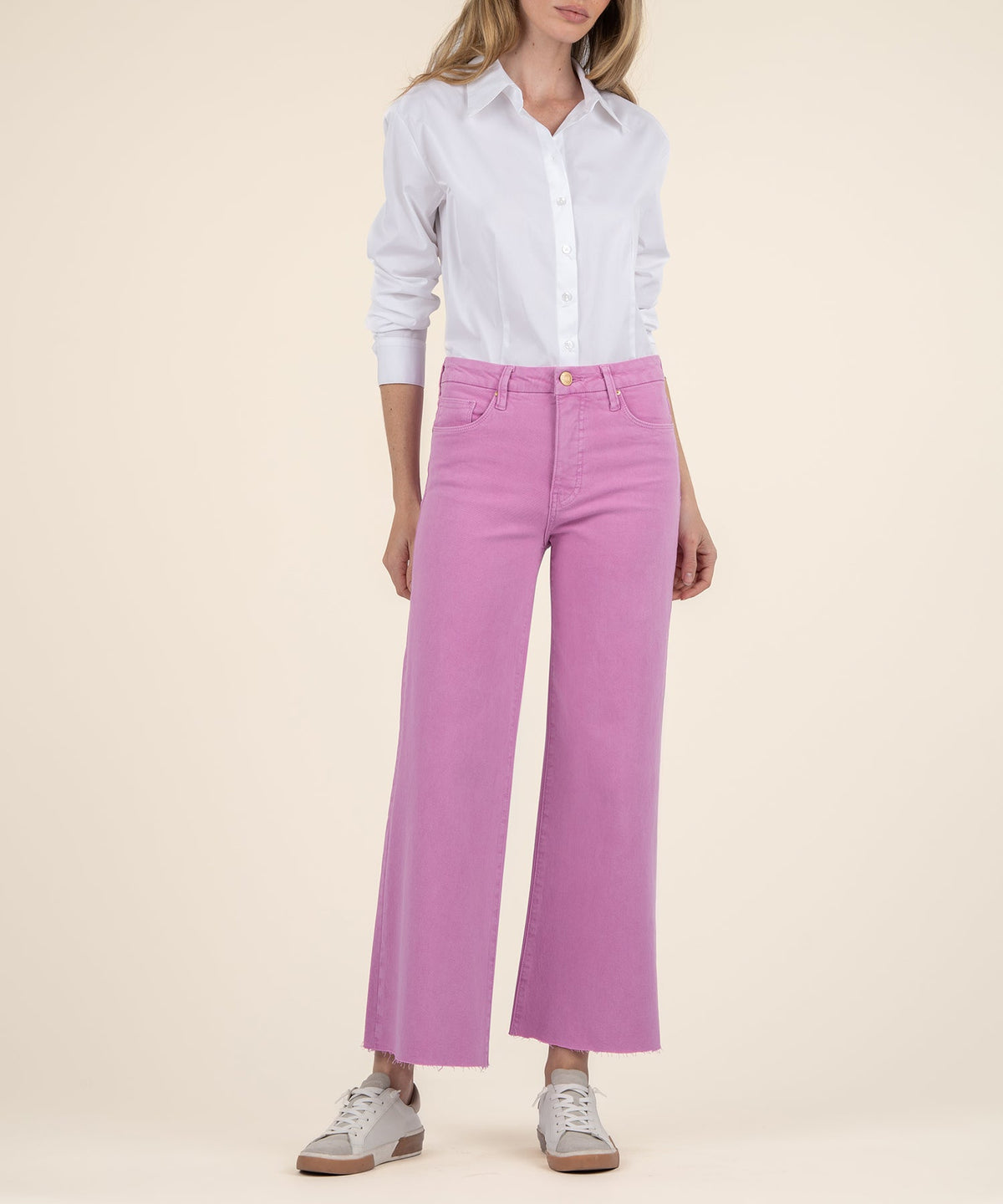 Front view of Meg high-rise wide-leg jeans in faded wash cotton with Fab Ab front pockets.