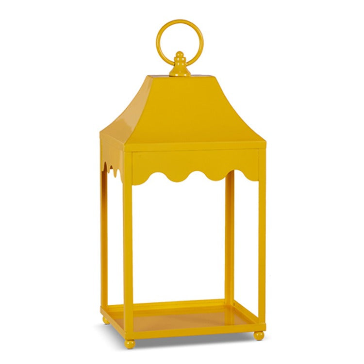 Yellow iron lantern with an openwork geometric frame measuring 18 inches in height.
