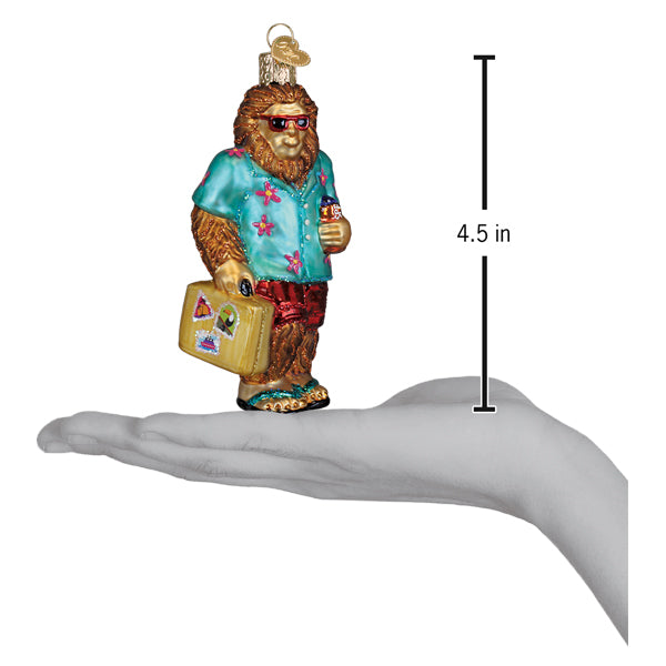 Sasquatch Gone Tropics ornament: Bigfoot figure in flip-flops and sunglasses with a tropical theme.