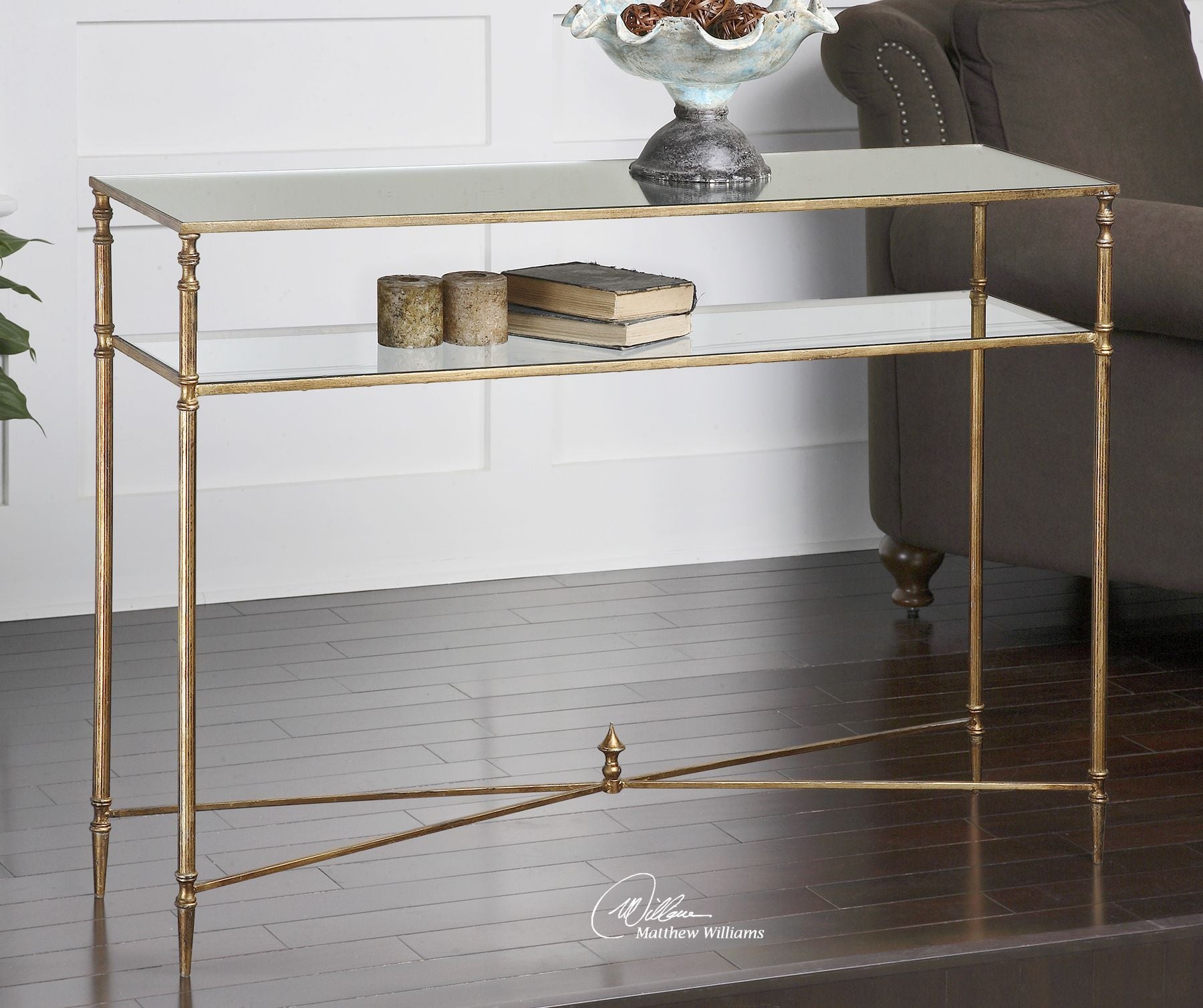 Henzler mirrored glass console table with a rectangular silver frame.