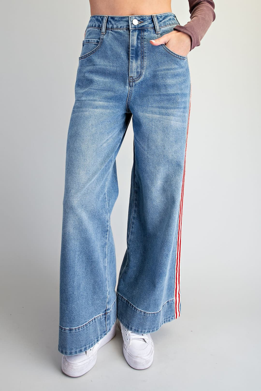Amelia high-waisted wide leg denim pants with red and white side stripes and thick bottom hem.