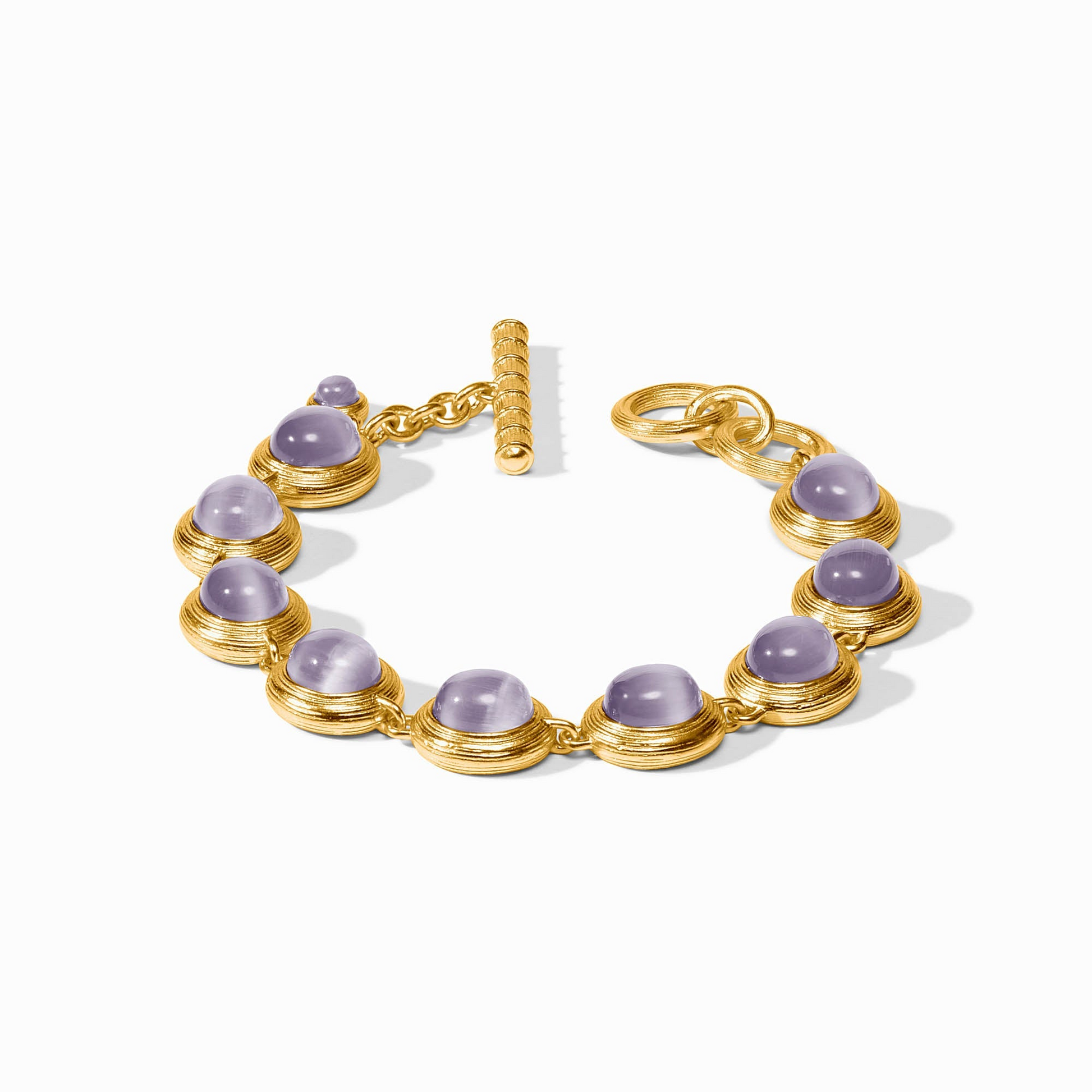 Gold-plated Cobblestone Tennis Bracelet with purple glass cabochons and a toggle closure.