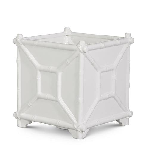 White ceramic square planter with a raised bamboo lattice design and small corner feet.