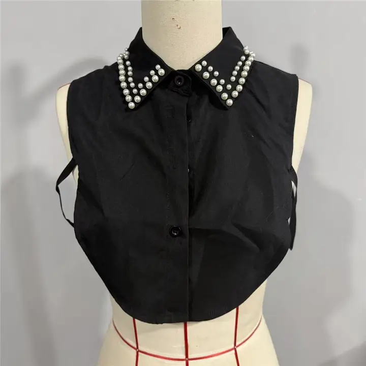 Black detachable shirt collar with pearl-like diamond studs on the collar points.