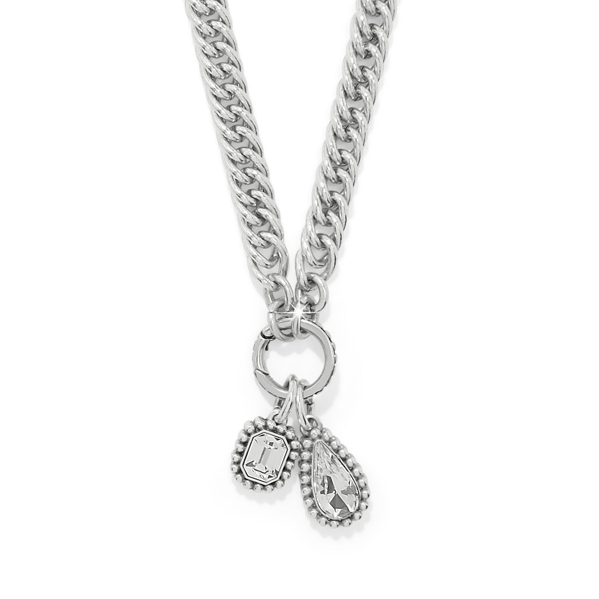 Silver plated adjustable link necklace with fine quality crystal pendant on lobster claw closure.
