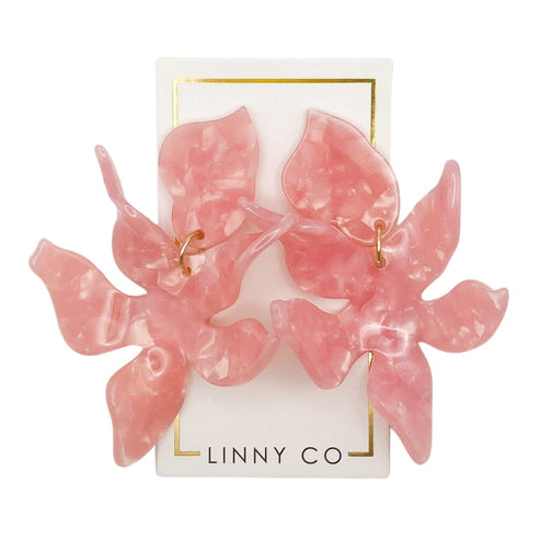 Flora abstract floral earring in light gold with delicate feather-like silhouette.
