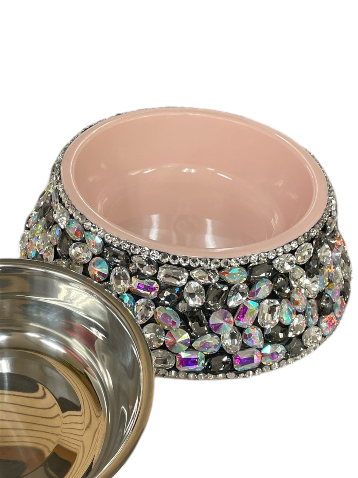 Pink pet bowl with rhinestone embellishments and a removable stainless steel inner dish.