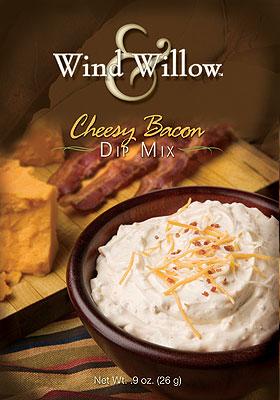Wind & Willow Cheesy Bacon Dip Mix in a bowl with bacon and cheese.