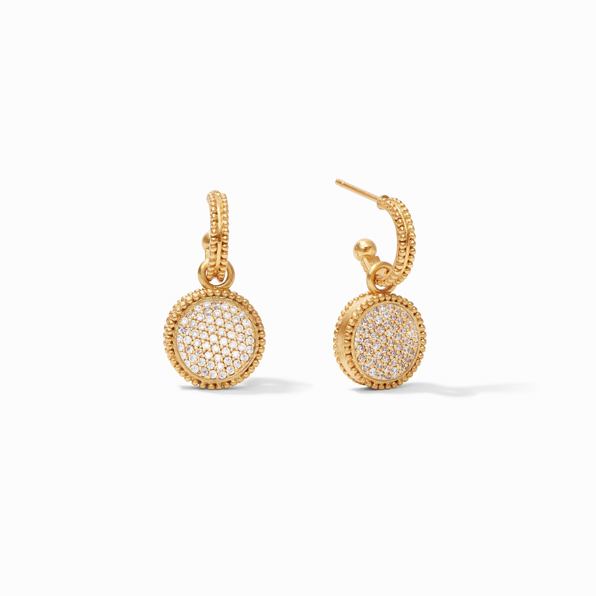 Gold hoop earrings with a reversible round charm featuring pavé gemstones and beaded edges.