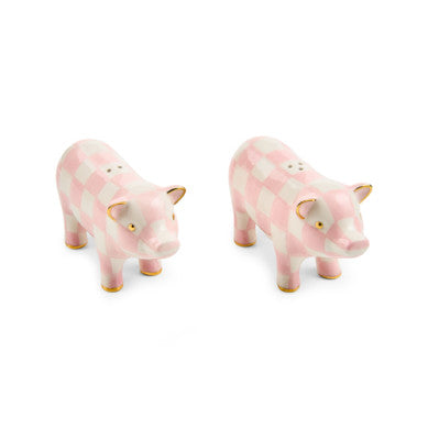 Ceramic salt and pepper shaker set in rosy pink with a rounded silhouette.