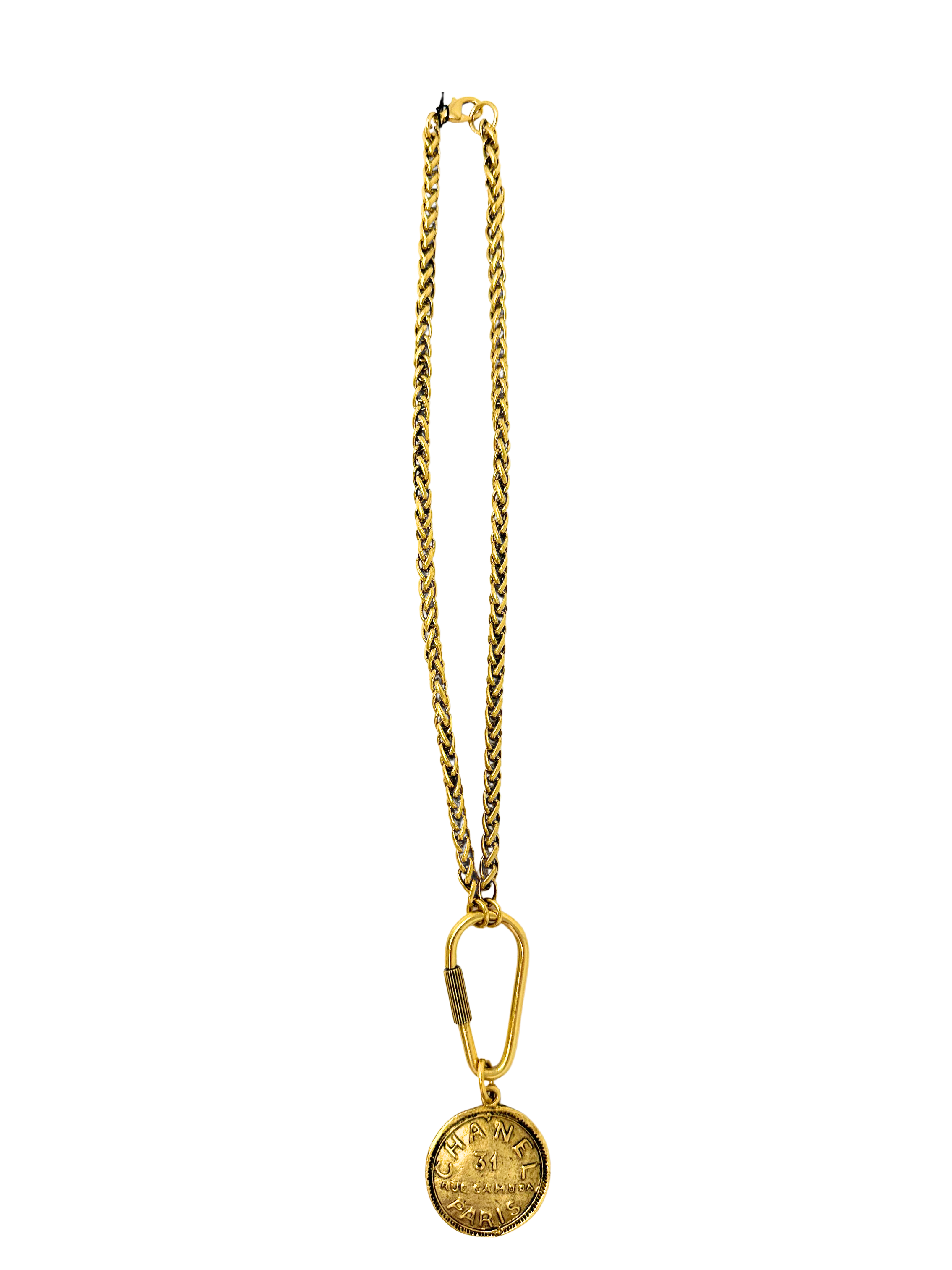17-inch gold chain necklace with a carabiner clasp and a Chanel-inspired coin pendant.