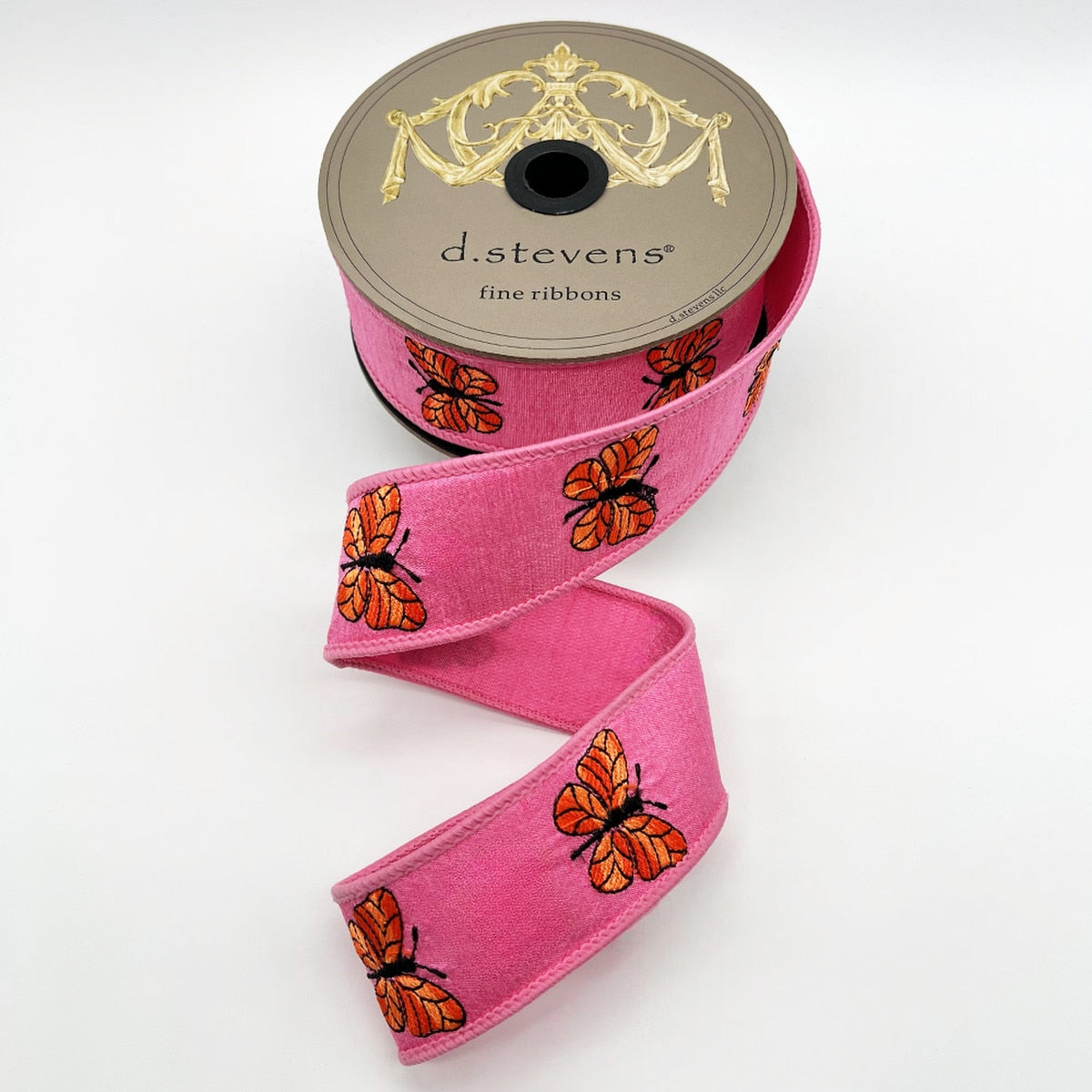 Two-tone orange dupion ribbon with embroidered butterflies and a hot pink satin bow.
