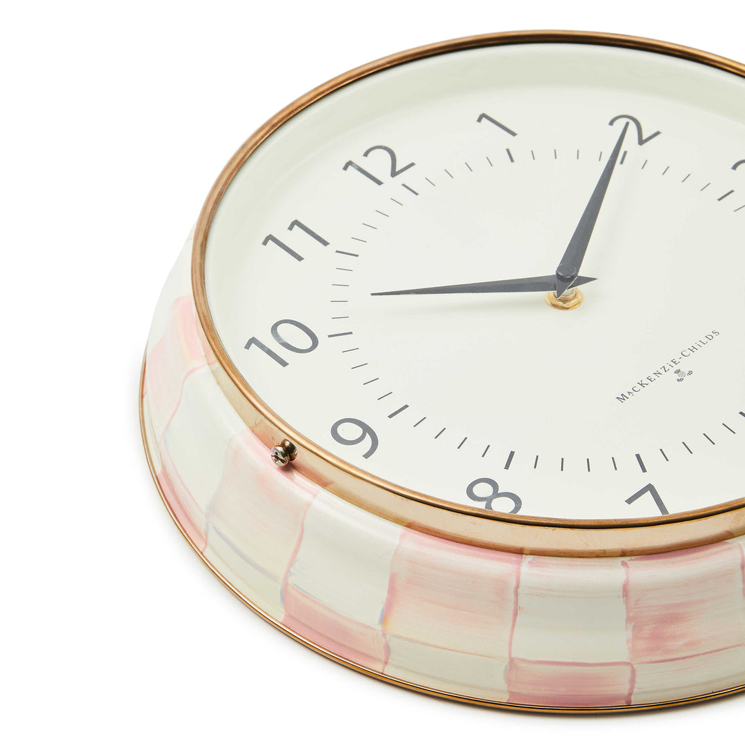 Close-up of a Rosy Check School Wall Clock with hand-painted pink checks and bronzed steel rim.
