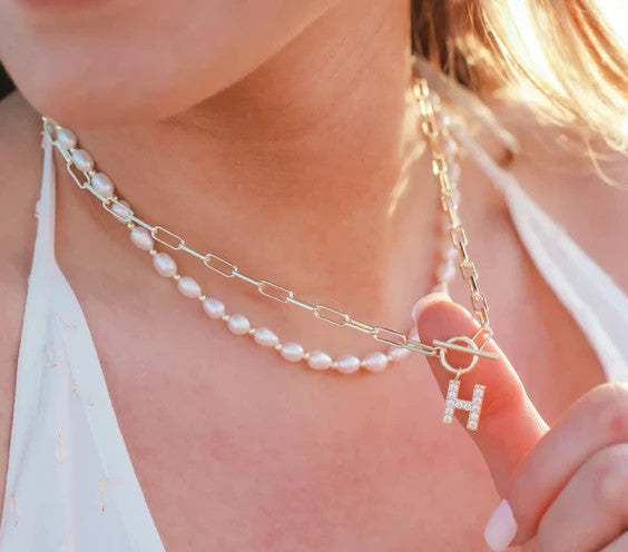 Sparkle Mini Toggle Initial Necklace in silver with a toggle closure