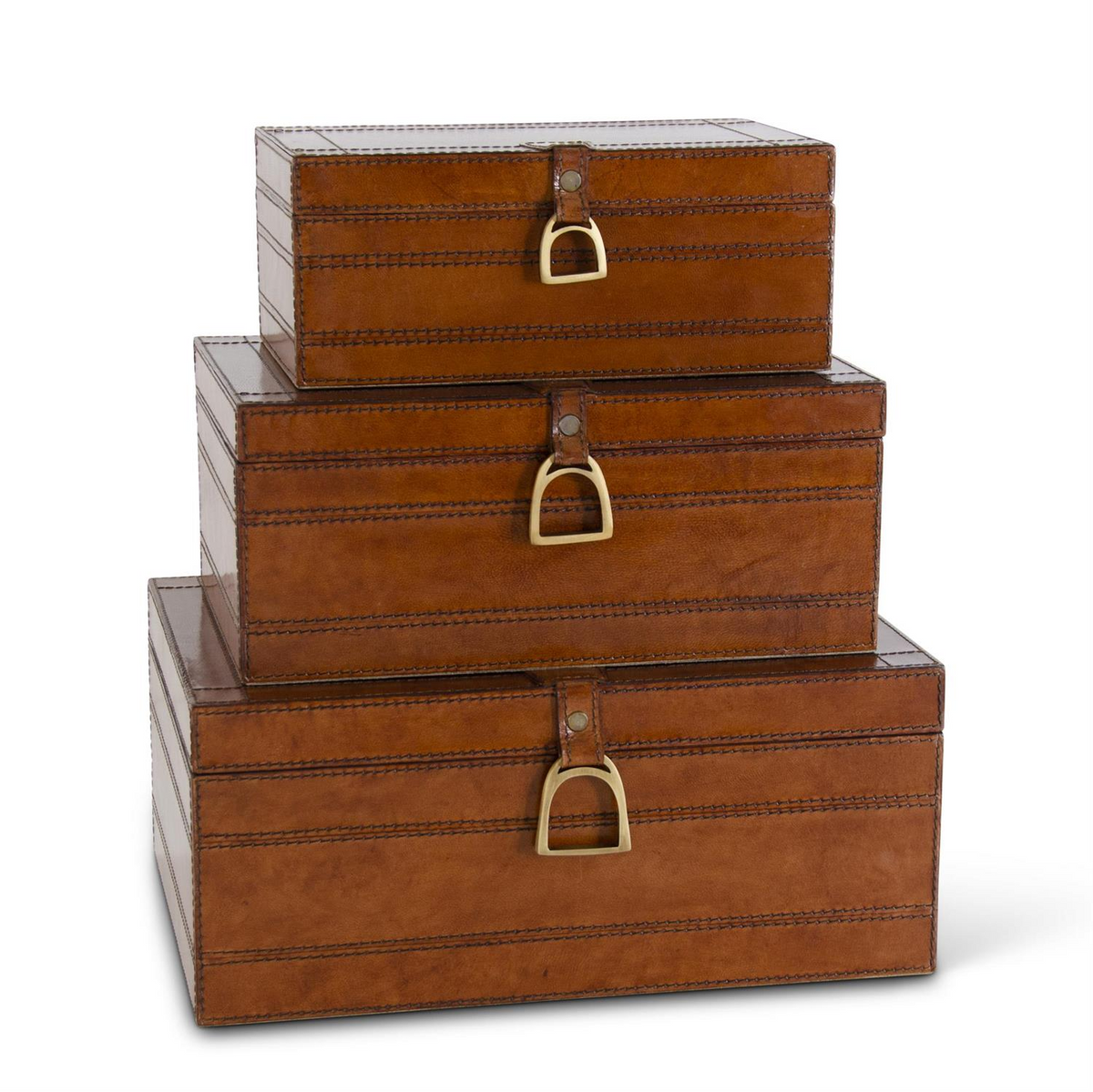 Three brown leather nesting boxes with suede lining and brass stirrup latches stacked by size.