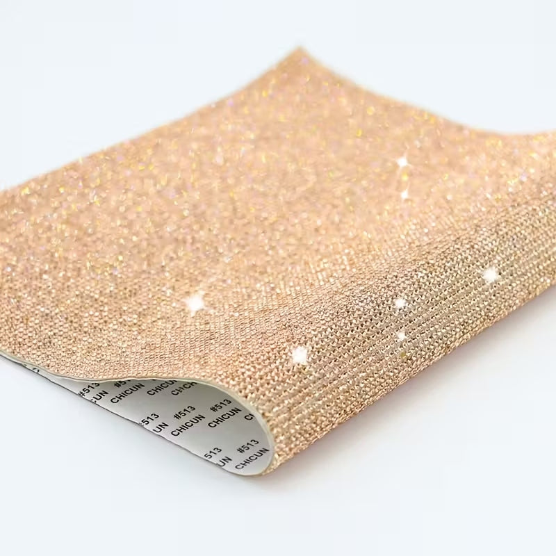 Gold rhinestone self-adhesive sheet measuring 12x20cm with a uniform pattern.