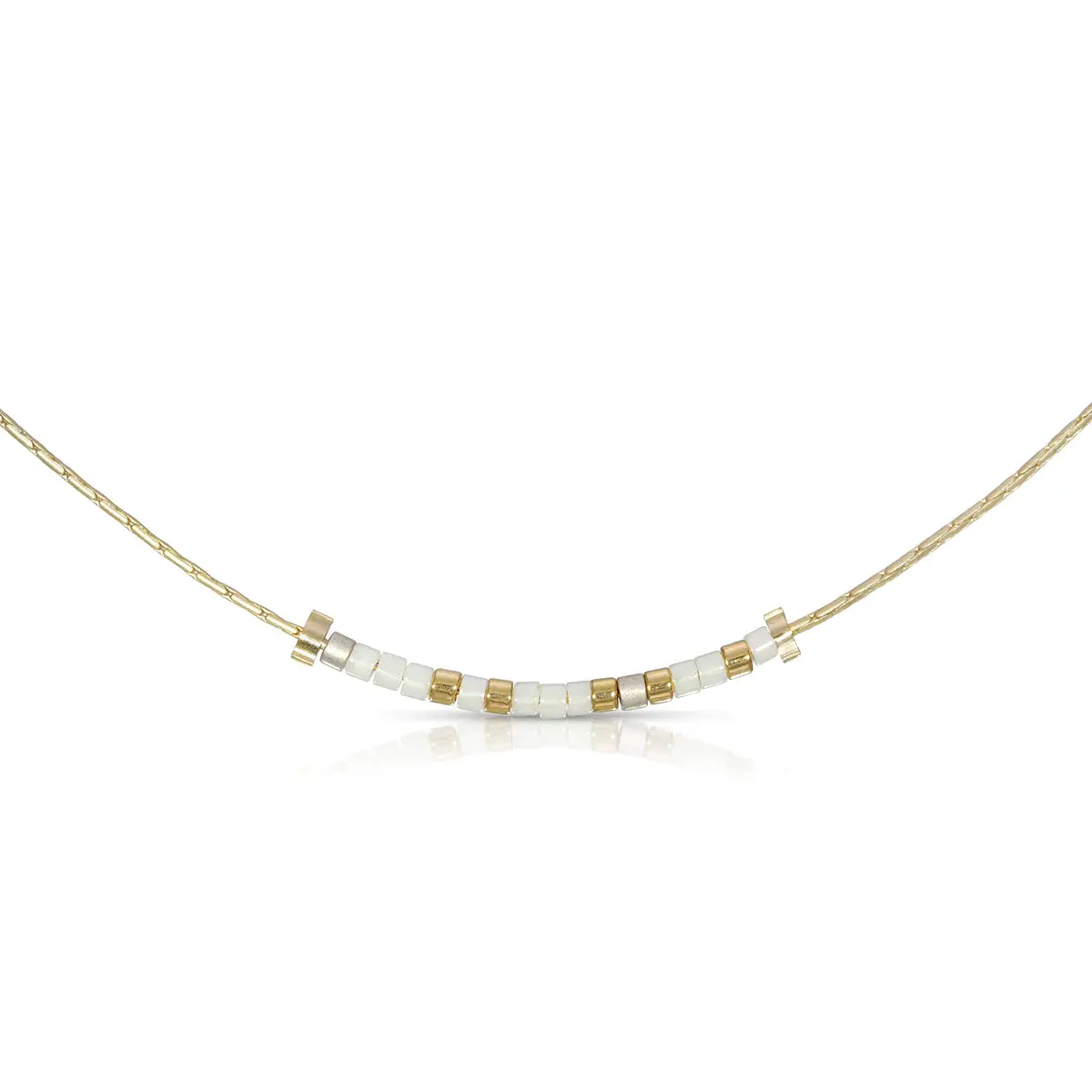 Bestie Morse code necklace with white and pewter glass beads on a gold chain.