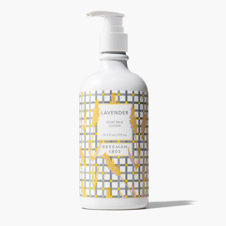 12.5oz Beekman 1802 Lavender Goat Milk Lotion in a white pump bottle with a yellow plaid label.