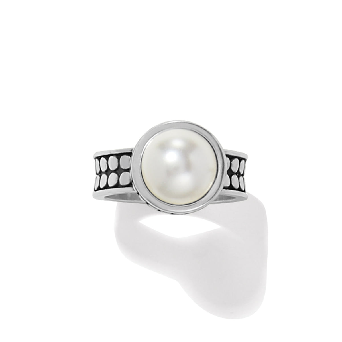 Silver plated wide band ring featuring a round glass pearl cabochon with Balinese craftsmanship.