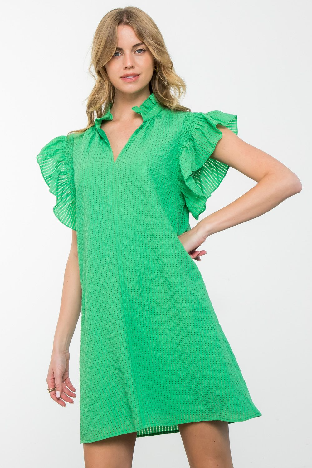 Women's Isabella dress in woven polyester with ruffle sleeves and textured fabric.