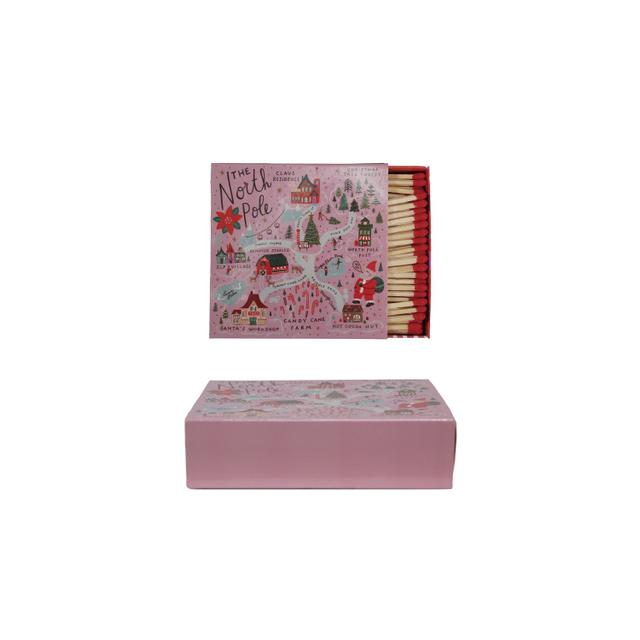 Matchbox safety matches featuring a North Pole scene with snow-covered figures on the front.