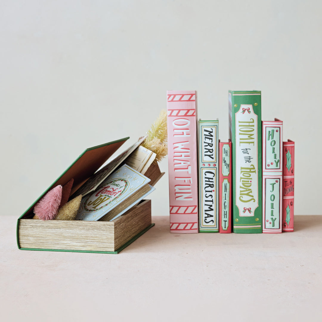 Set of three festive MDF and canvas book storage boxes with holiday-themed titles and designs.